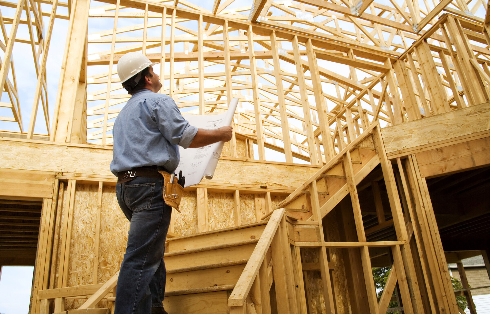 Industrial vs Home Construction site comparison showing equipment and building scale differences